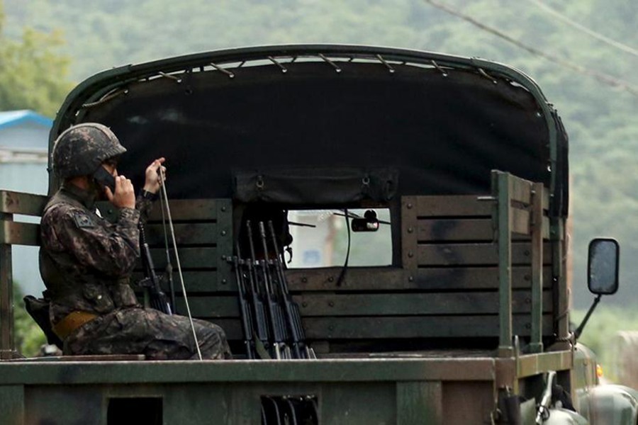 North and South Korea exchange gunfire across border.