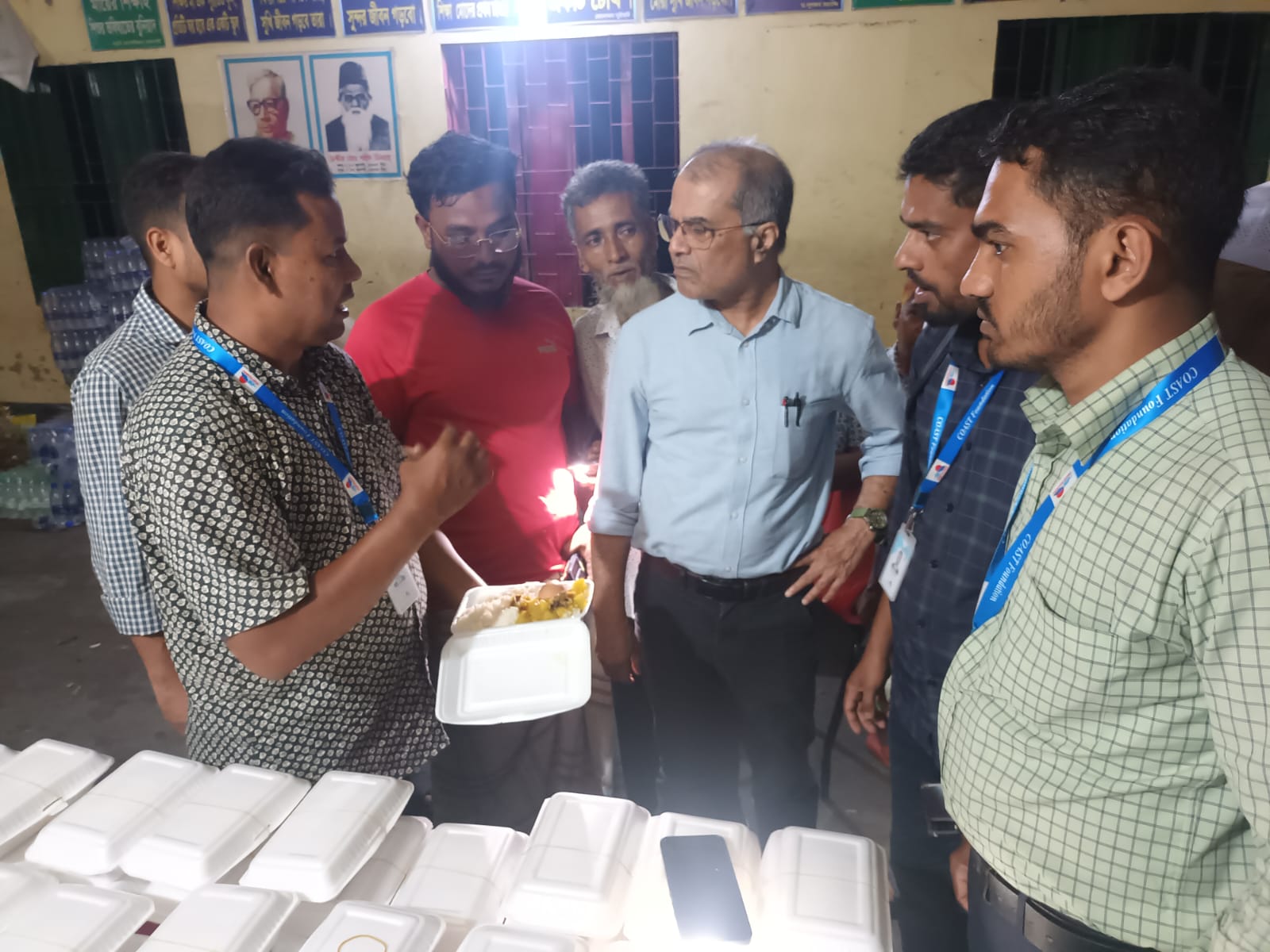 COAST provides hot meal to flood victims in Feni