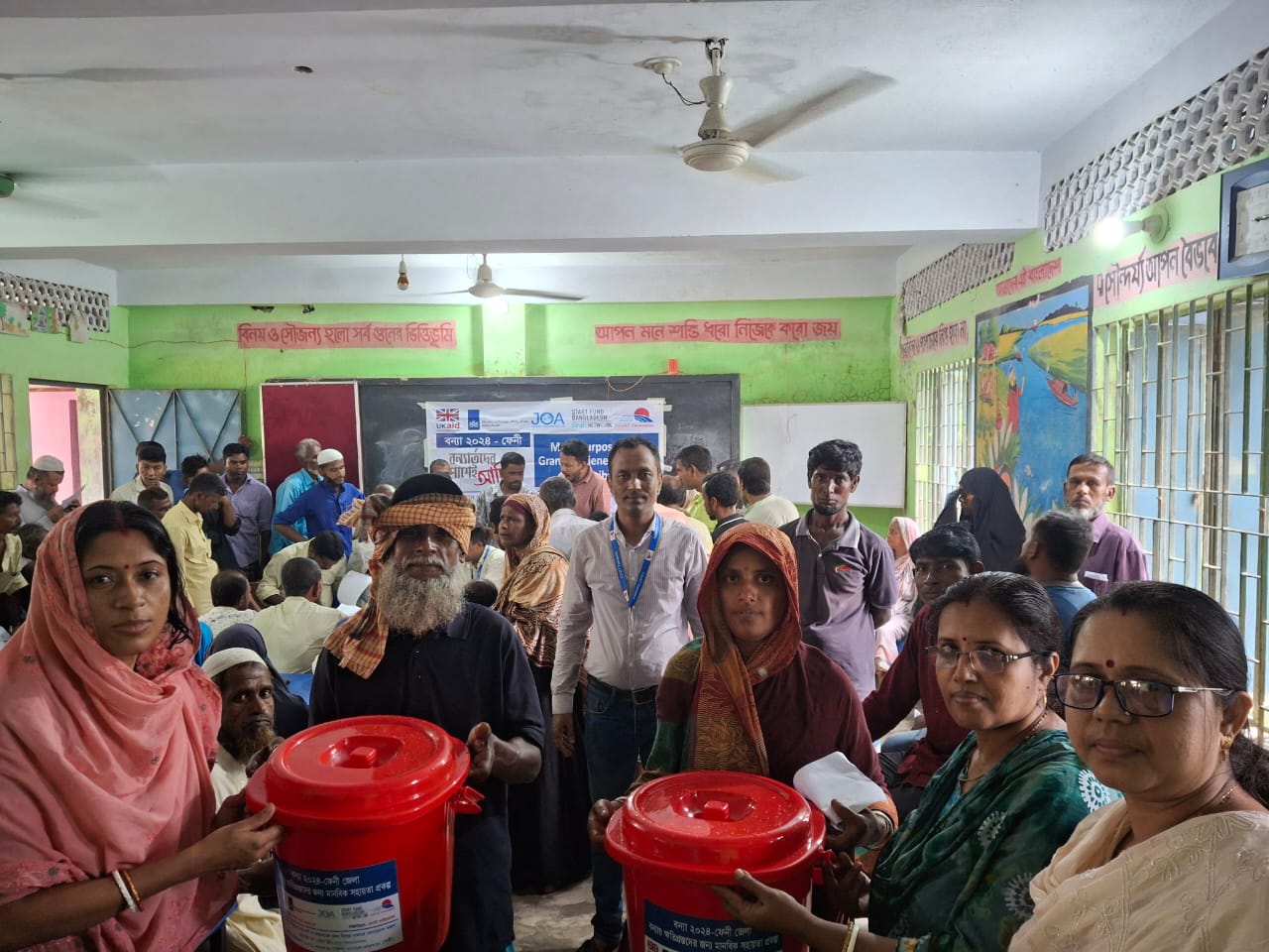 Cash and health materials distributed to the flood victims in Kalidah, Feni