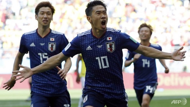 Japan hold Senegal 2-2 draw keeping last-16 hopes alive