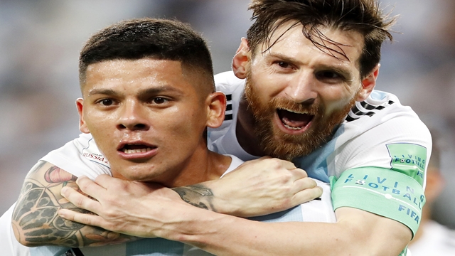 Messi, Rojo throw Argentina into World Cup last 16