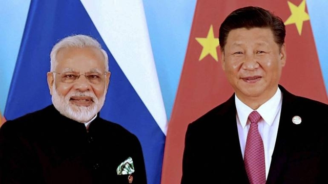 Xi meets Modi, eyes 'new chapter' in China-India ties